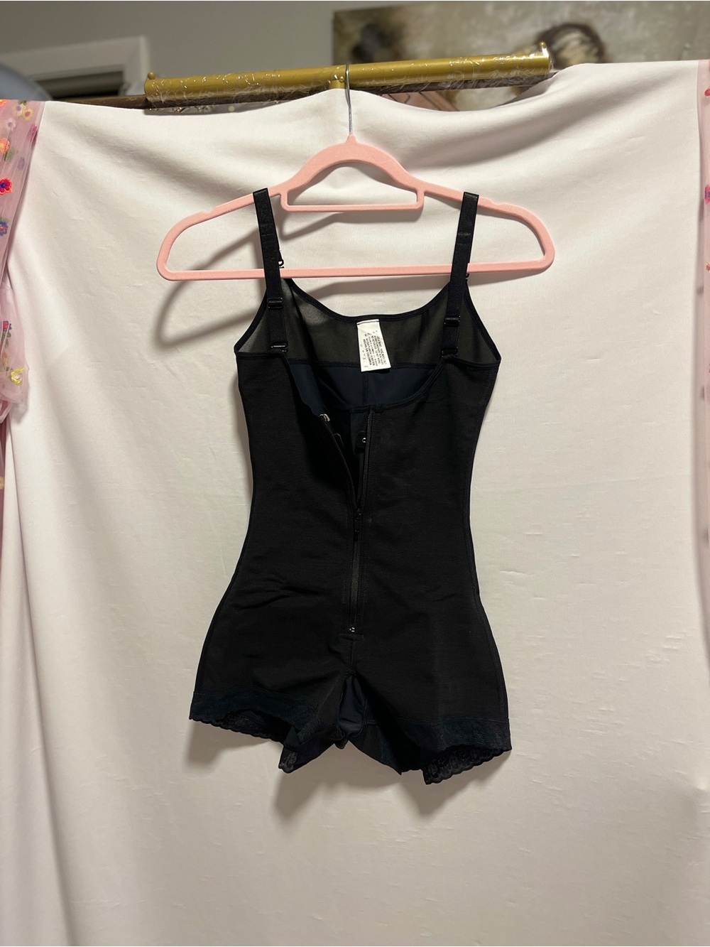 Black Sculpting Bodysuit with Front Zip and Adjustable Straps